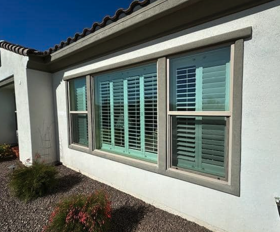 Window screens rinsed and reinstalled on a Phoenix home